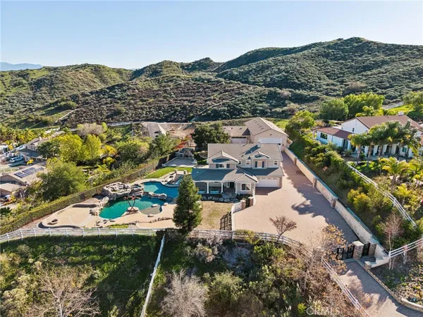a kitchen with stainless steel appliances granite countertop a stove and cabinets