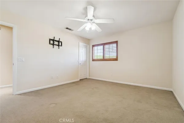 a kitchen with stainless steel appliances granite countertop a refrigerator a sink a stove a microwave oven with cabinets