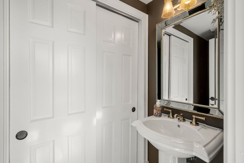 122 Clifford Road Plymouth, MA 02360 - Photo 19 of 38 a bathroom with a sink and a mirror