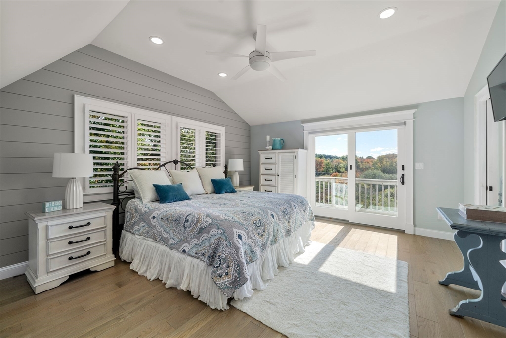 122 Clifford Road Plymouth, MA 02360 - Photo 23 of 38 a spacious bedroom with a large bed and a large window