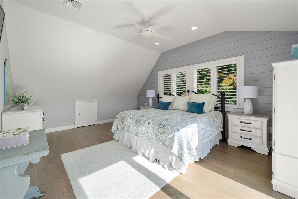 122 Clifford Road Plymouth, MA 02360 - Photo 24 of 38 a bedroom with a large bed and wooden floor