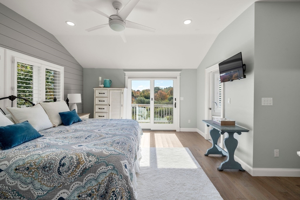 122 Clifford Road Plymouth, MA 02360 - Photo 25 of 38 a bedroom with a bed and wooden floor
