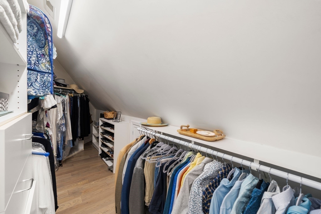 122 Clifford Road Plymouth, MA 02360 - Photo 28 of 38 a view of walk in closet with clothes and shoes