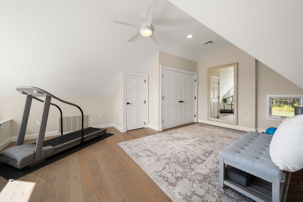 122 Clifford Road Plymouth, MA 02360 - Photo 31 of 38 a view of a hallway with wooden floor and staircase
