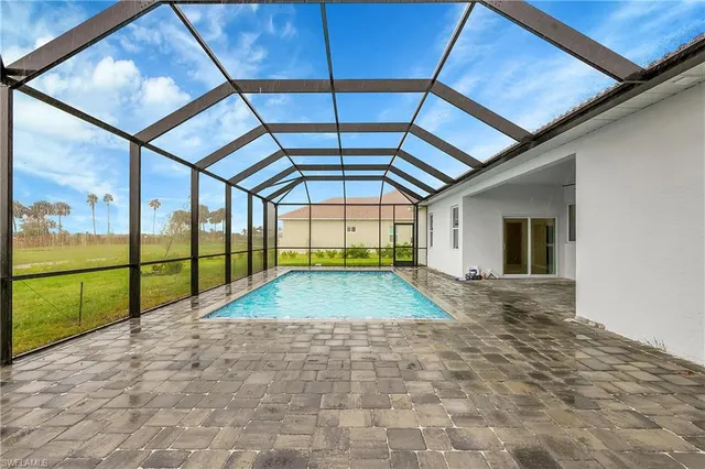 a view of a house with a big yard