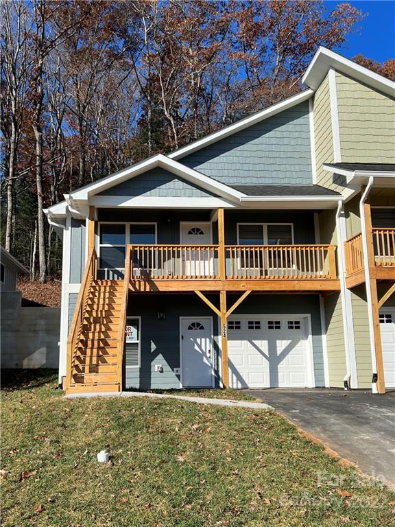 524 Sycamore Br Road Asheville, NC 28803 - Photo 1 of 1 a front view of a house with a yard
