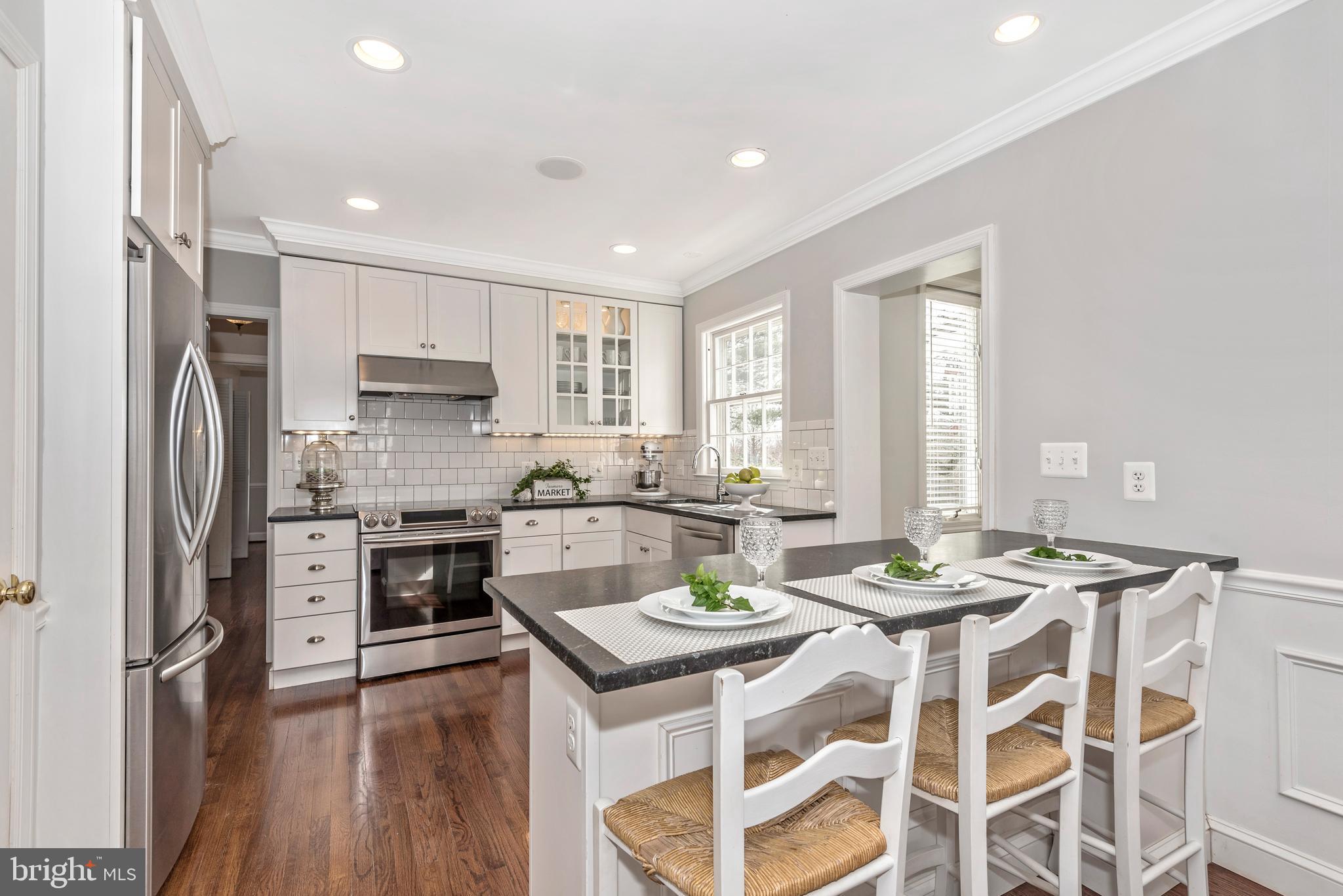 Renovated Custom Kitchen with Bar Seating