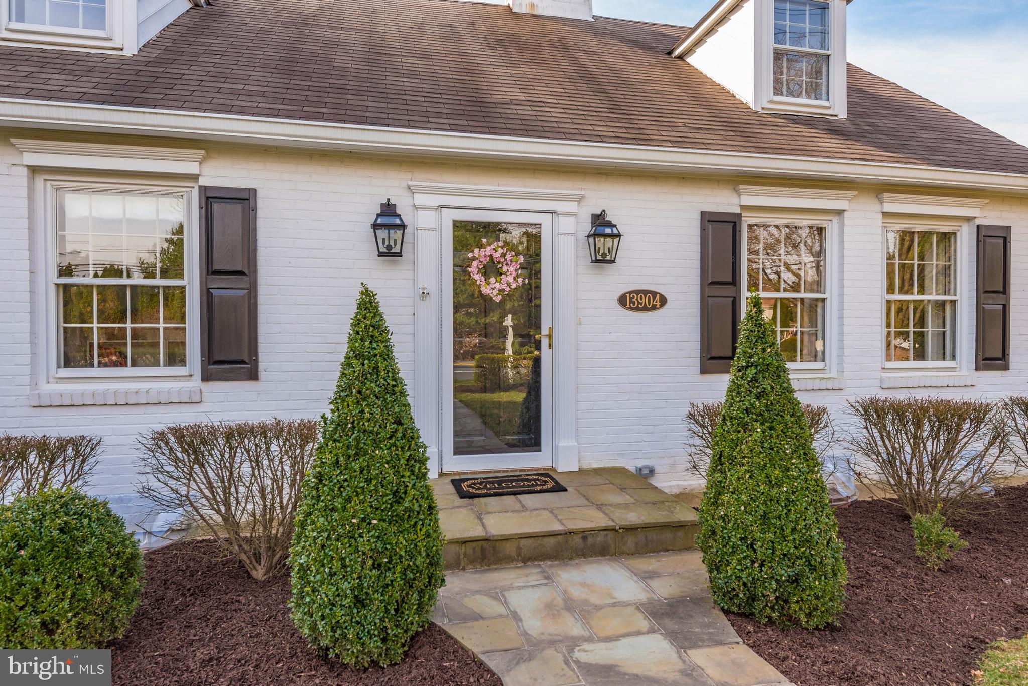 13904 Darnestown Road Gaithersburg, MD 20878 - Photo 41 of 42 A stone walkway leads you to the entrance