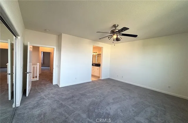 a view of a house with a ceiling fan