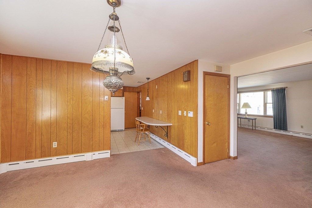 1850 Rodman Street Fall River, MA 02721 - Photo 17 of 42 a very nice looking room with a chandelier