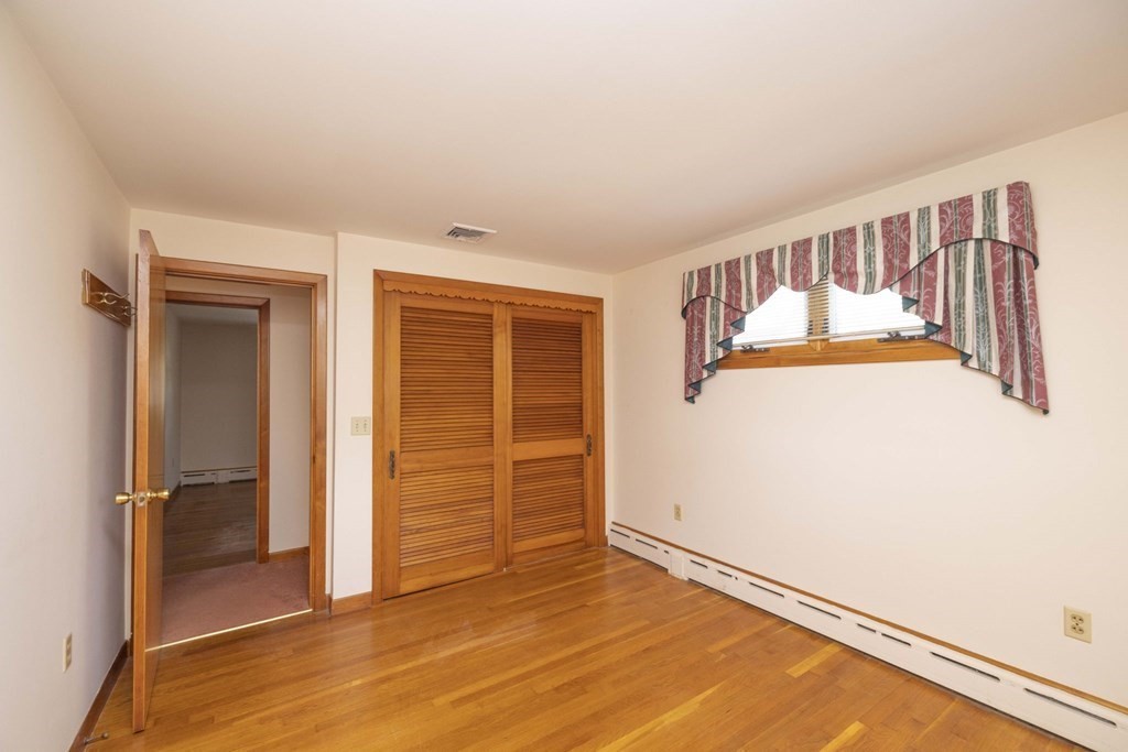 1850 Rodman Street Fall River, MA 02721 - Photo 24 of 42 an entryway of a house with wooden floor