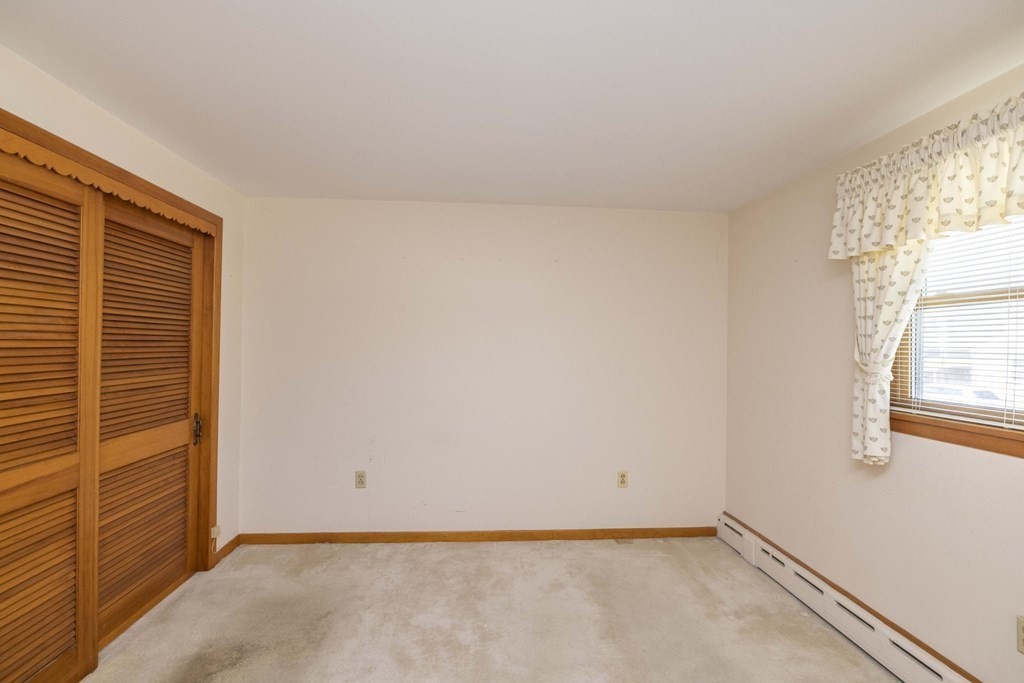1850 Rodman Street Fall River, MA 02721 - Photo 32 of 42 a view of an empty room with a window