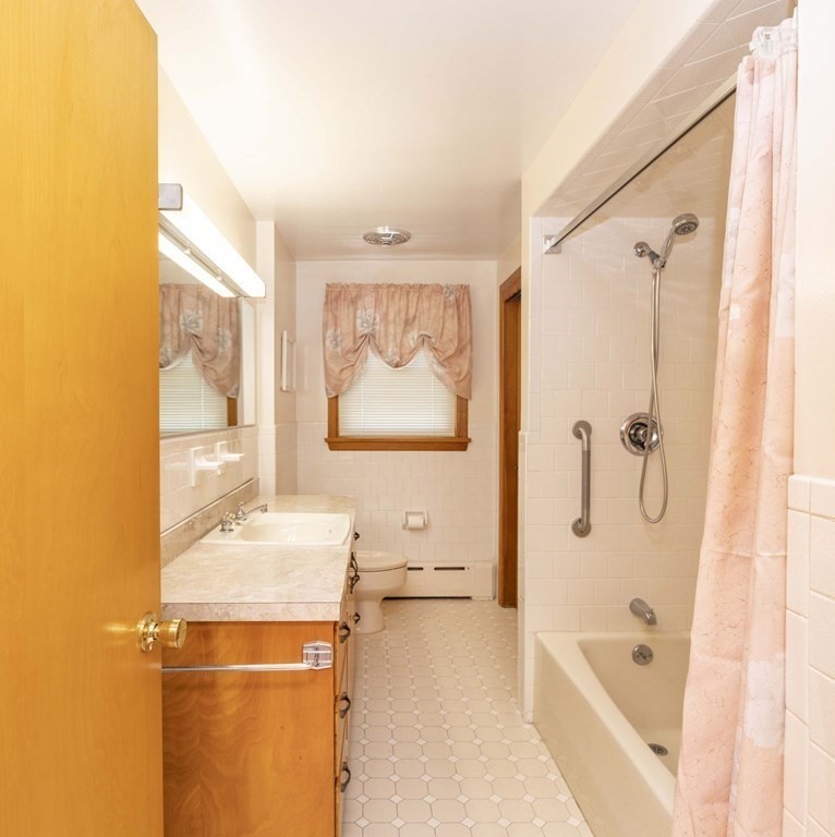 1850 Rodman Street Fall River, MA 02721 - Photo 33 of 42 a bathroom with a bathtub and a shower