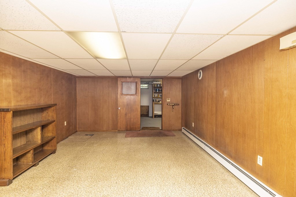 1850 Rodman Street Fall River, MA 02721 - Photo 38 of 42 a view of empty room with a fireplace