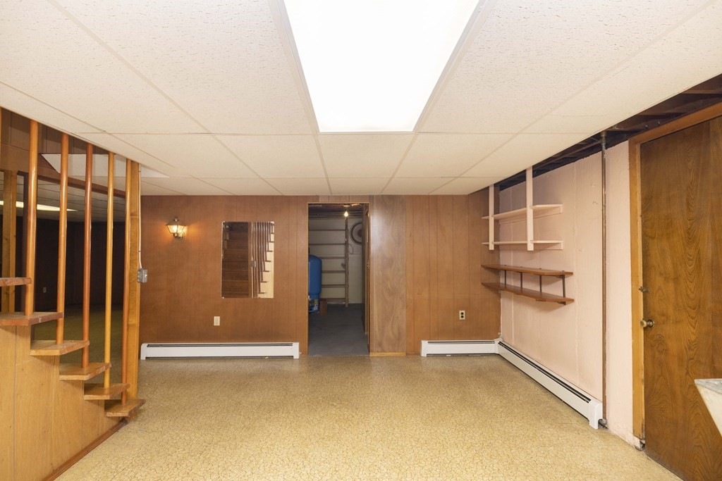 1850 Rodman Street Fall River, MA 02721 - Photo 39 of 42 a view of an empty room with a fireplace