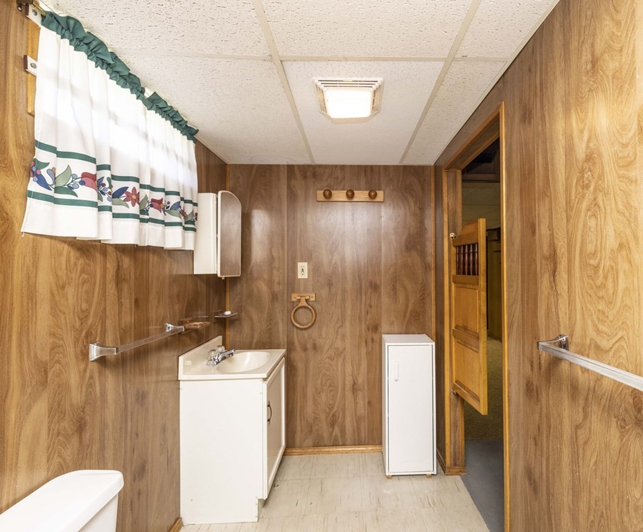 1850 Rodman Street Fall River, MA 02721 - Photo 41 of 42 a bathroom with a sink a toilet and shower