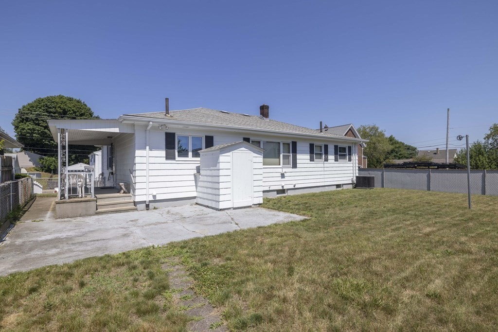 1850 Rodman Street Fall River, MA 02721 - Photo 9 of 42 front view of a house with a patio
