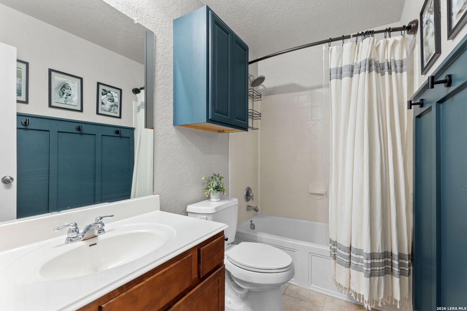 3041 Turquoise Schertz, TX 78154 - Photo 11 of 19 a bathroom with a sink toilet and shower