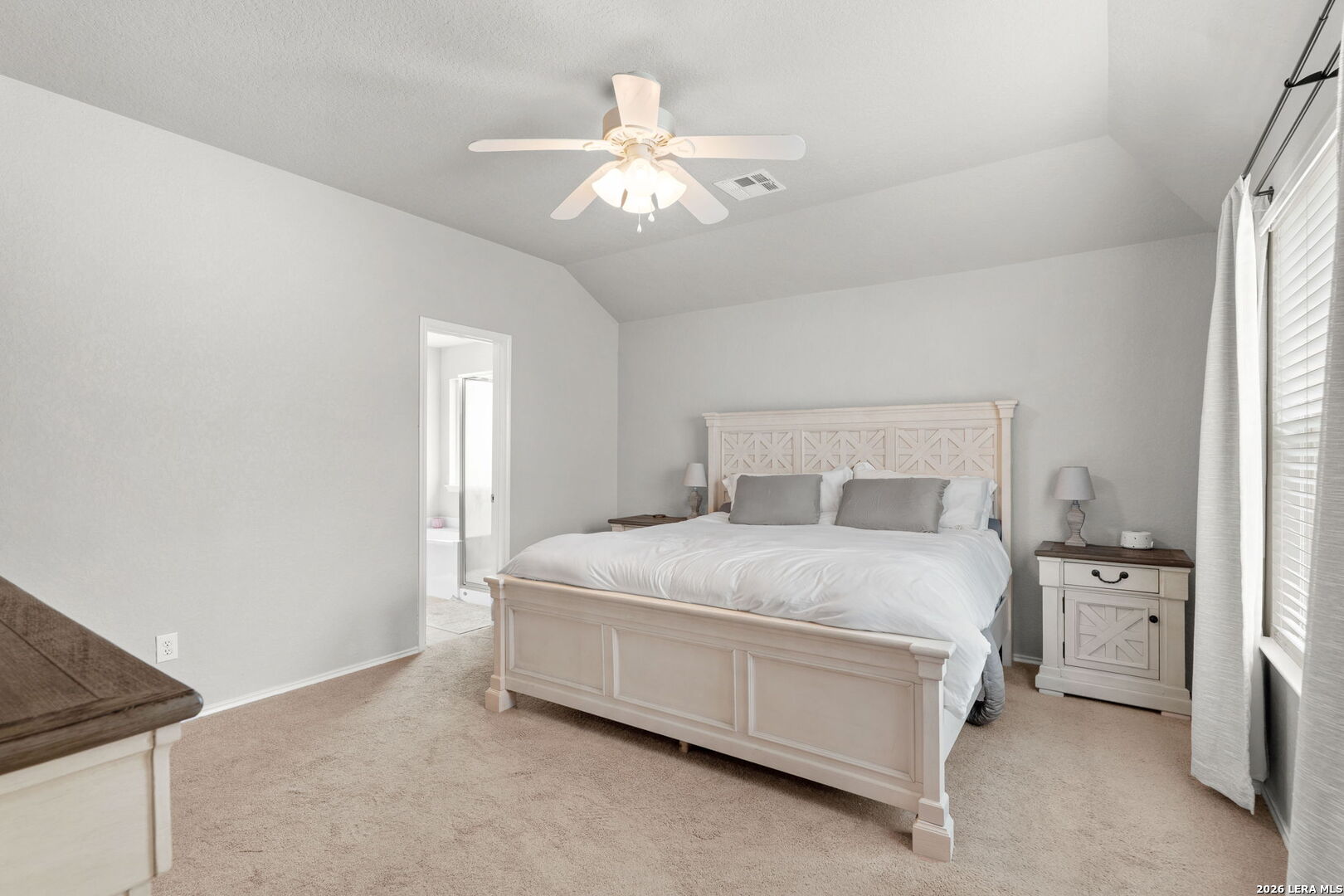 3041 Turquoise Schertz, TX 78154 - Photo 14 of 19 a bedroom with a bed and a chandelier