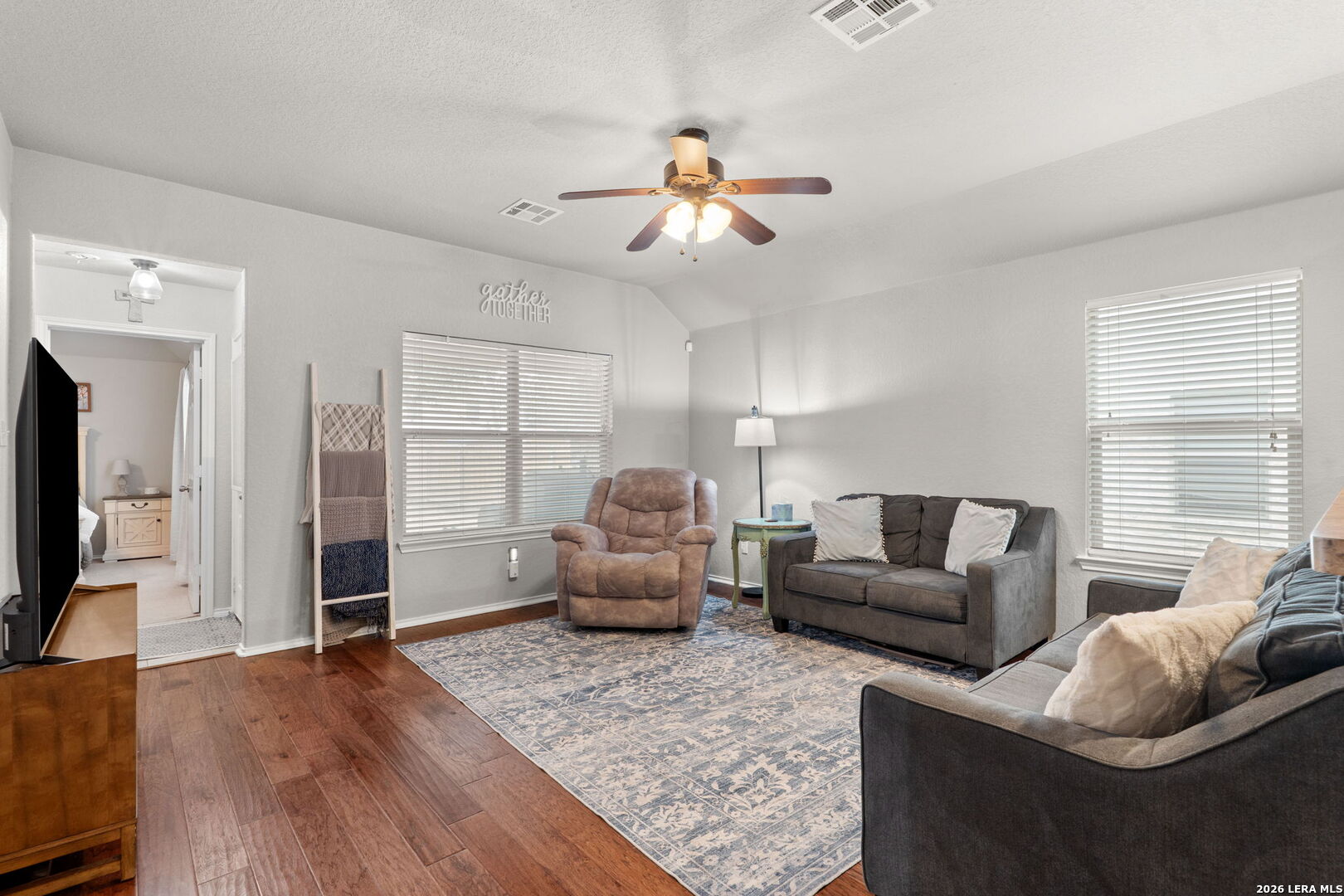 3041 Turquoise Schertz, TX 78154 - Photo 7 of 19 a living room with furniture and a flat screen tv