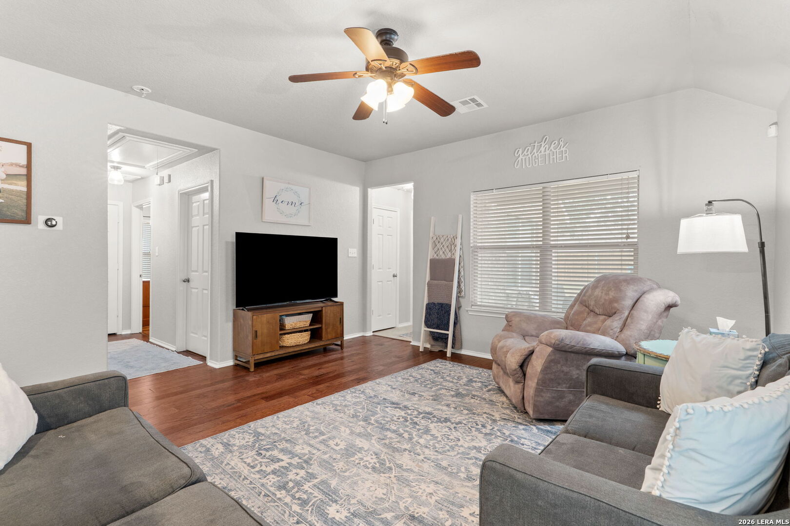 3041 Turquoise Schertz, TX 78154 - Photo 9 of 19 a living room with furniture and a flat screen tv