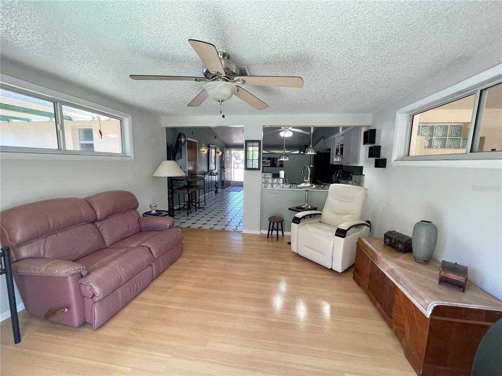 6944 Larchmont Avenue New Port Richey, FL 34653 - Photo 18 of 28 a living room with furniture
