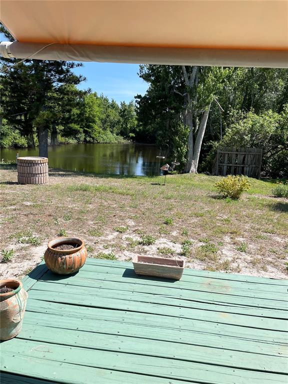 6944 Larchmont Avenue New Port Richey, FL 34653 - Photo 21 of 28 a lake view with a lake view