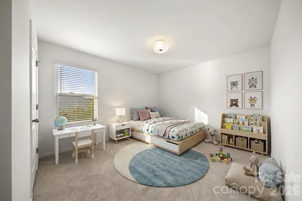 a large kitchen with stainless steel appliances granite countertop a stove a sink dishwasher a microwave oven and a refrigerator