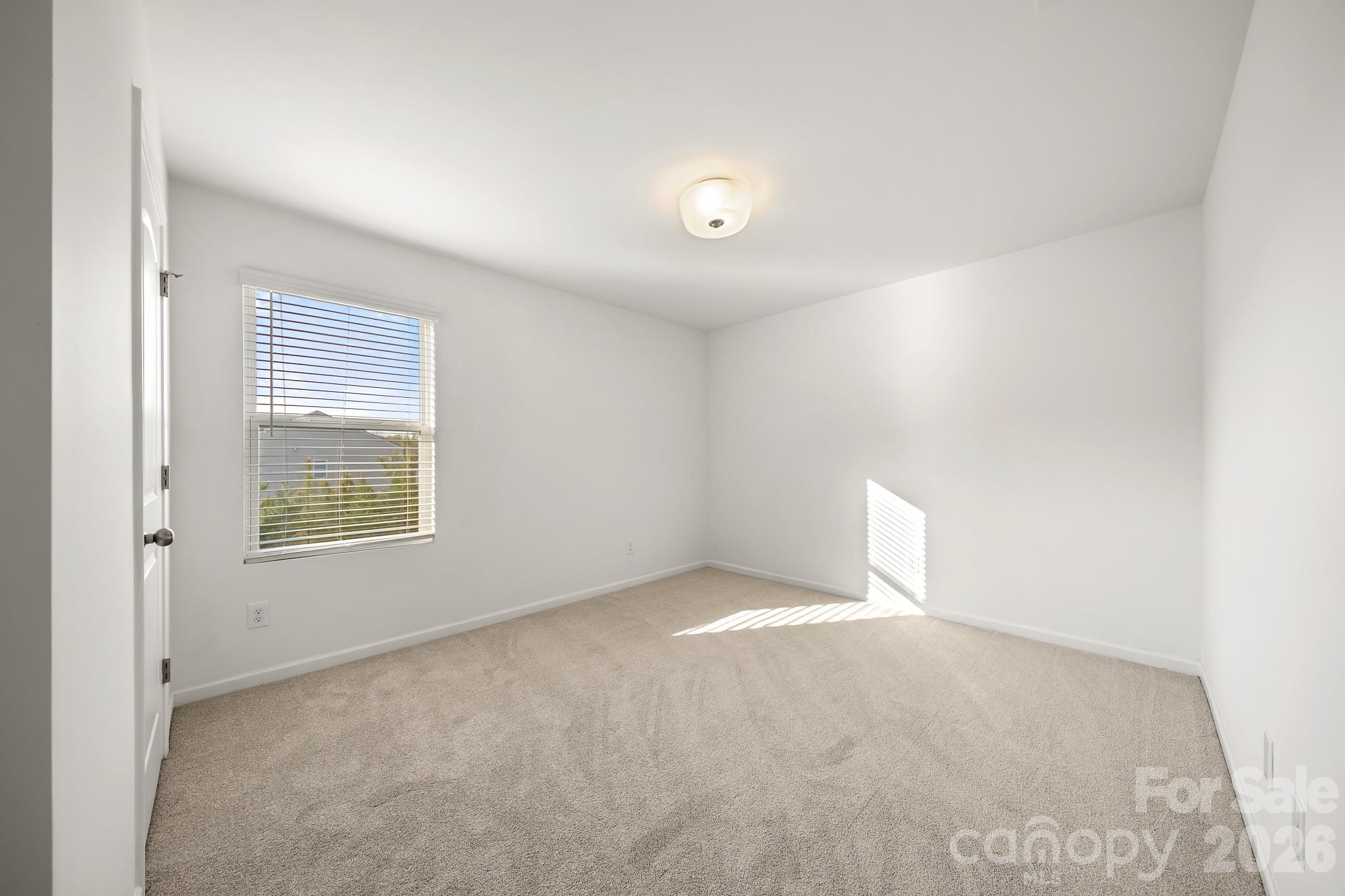 2838 Kinloch Court Clover, SC 29710 - Photo 33 of 42 an empty room with a window