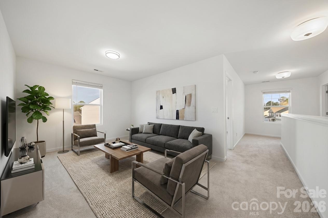 2838 Kinloch Court Clover, SC 29710 - Photo 8 of 42 a living room with furniture and a couch