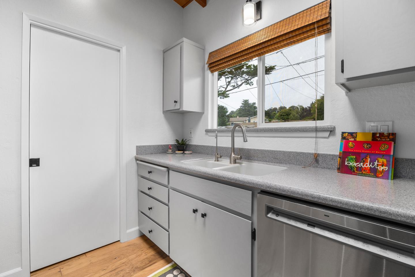 326 Doris Avenue Aptos, CA 95003 - Photo 12 of 48 a kitchen with a sink and a window