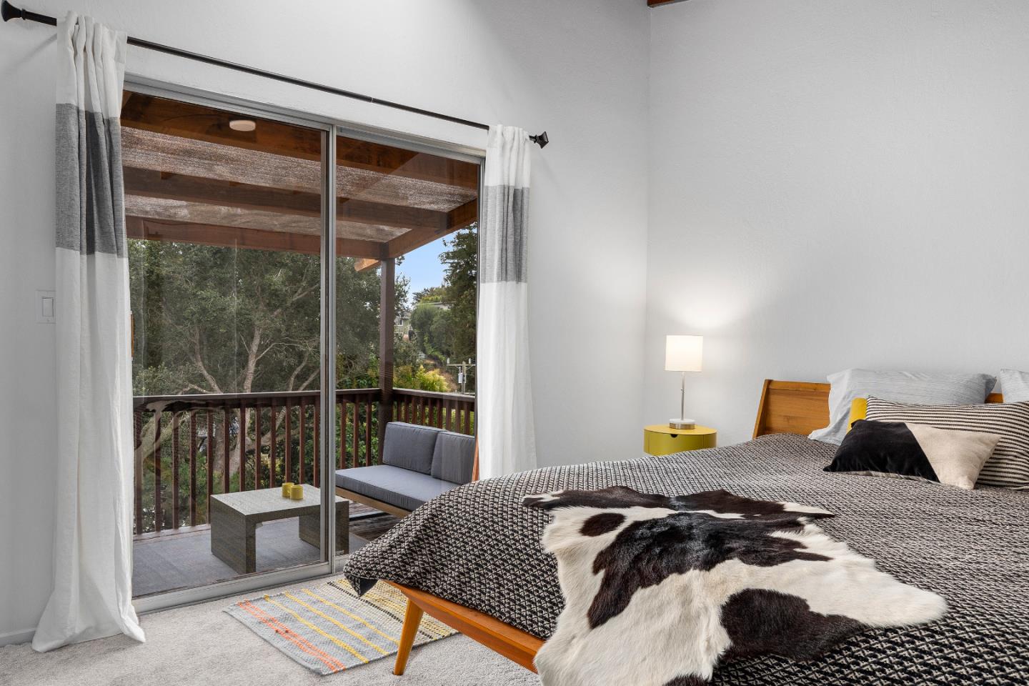 326 Doris Avenue Aptos, CA 95003 - Photo 15 of 48 a bedroom with a bed and wooden floor