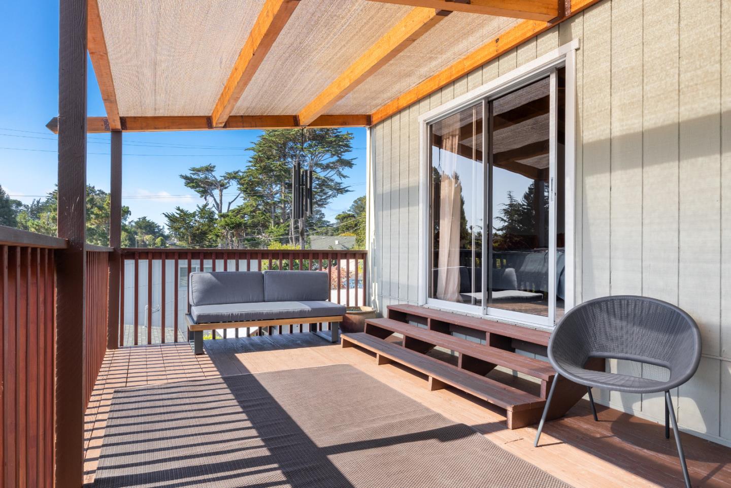 326 Doris Avenue Aptos, CA 95003 - Photo 19 of 48 a balcony with wooden floor table and chairs