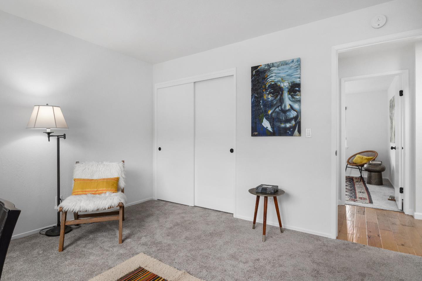 326 Doris Avenue Aptos, CA 95003 - Photo 27 of 48 a bedroom with a bed and a chandelier