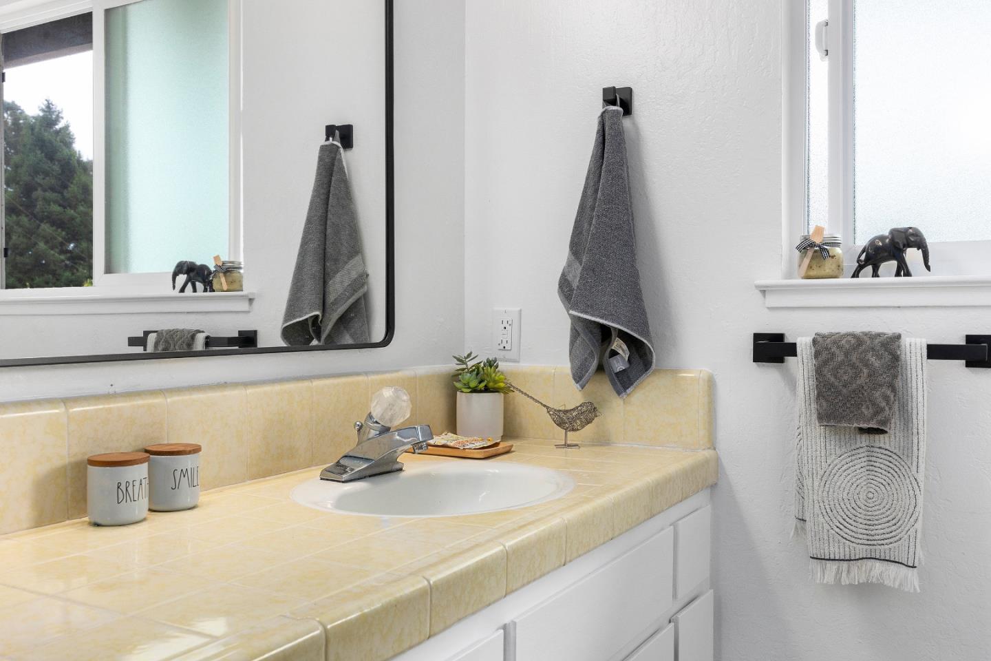 326 Doris Avenue Aptos, CA 95003 - Photo 30 of 48 a bathroom with a sink and a mirror