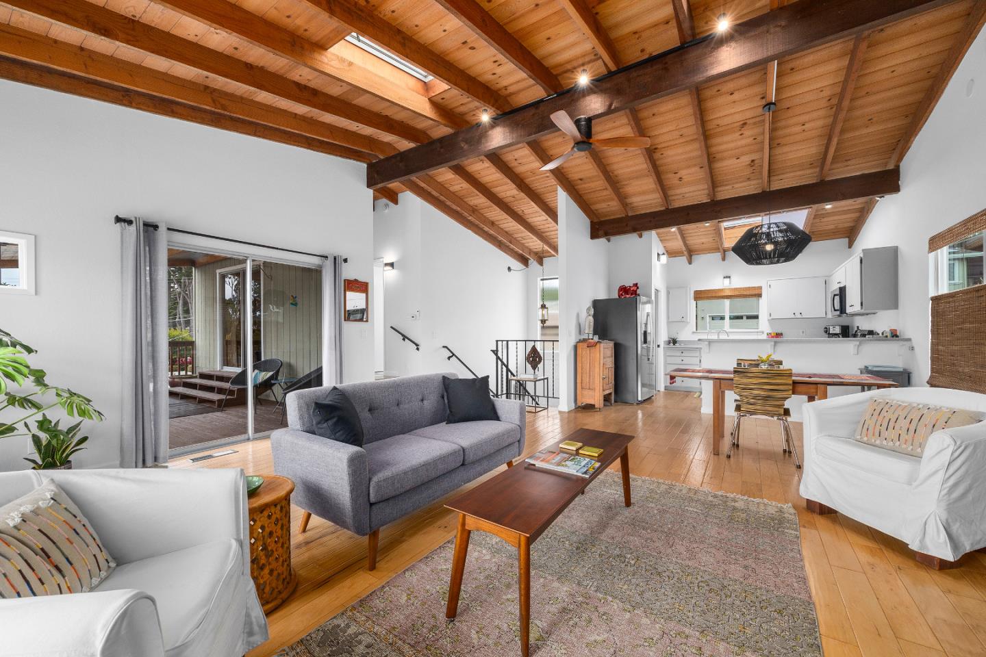 326 Doris Avenue Aptos, CA 95003 - Photo 6 of 48 a living room with furniture and a chandelier