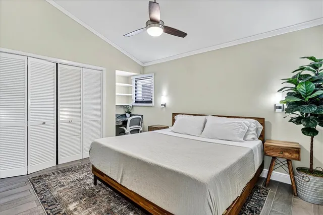 a large white bed in a white room