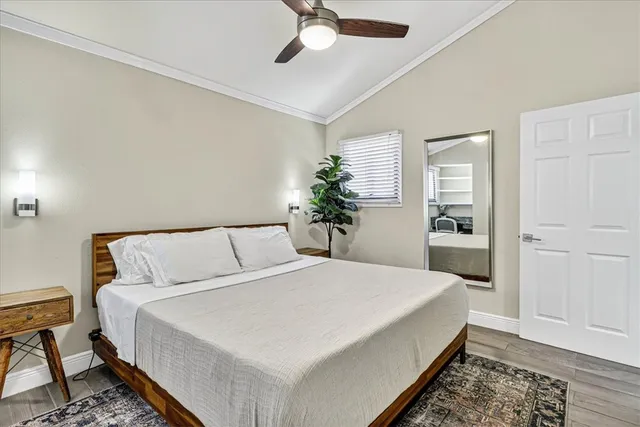 a large white bed in a white room