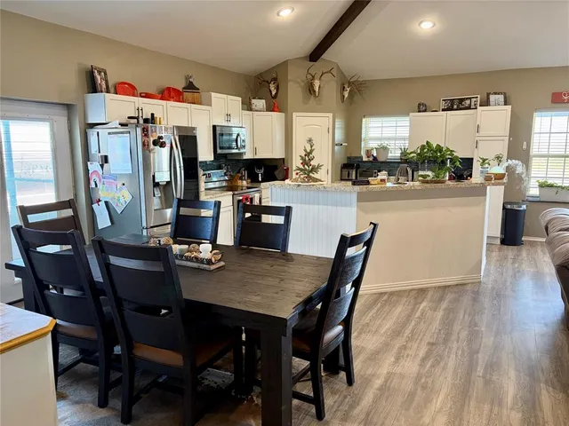 a view of a lobby with furniture and potted plant