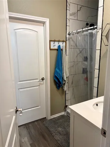 a bedroom with a bed and television