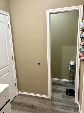 a utility room with cabinets