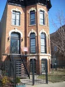 3429 South Indiana Avenue Chicago, IL 60616 - Photo 1 of 1 front view of a brick house with a door