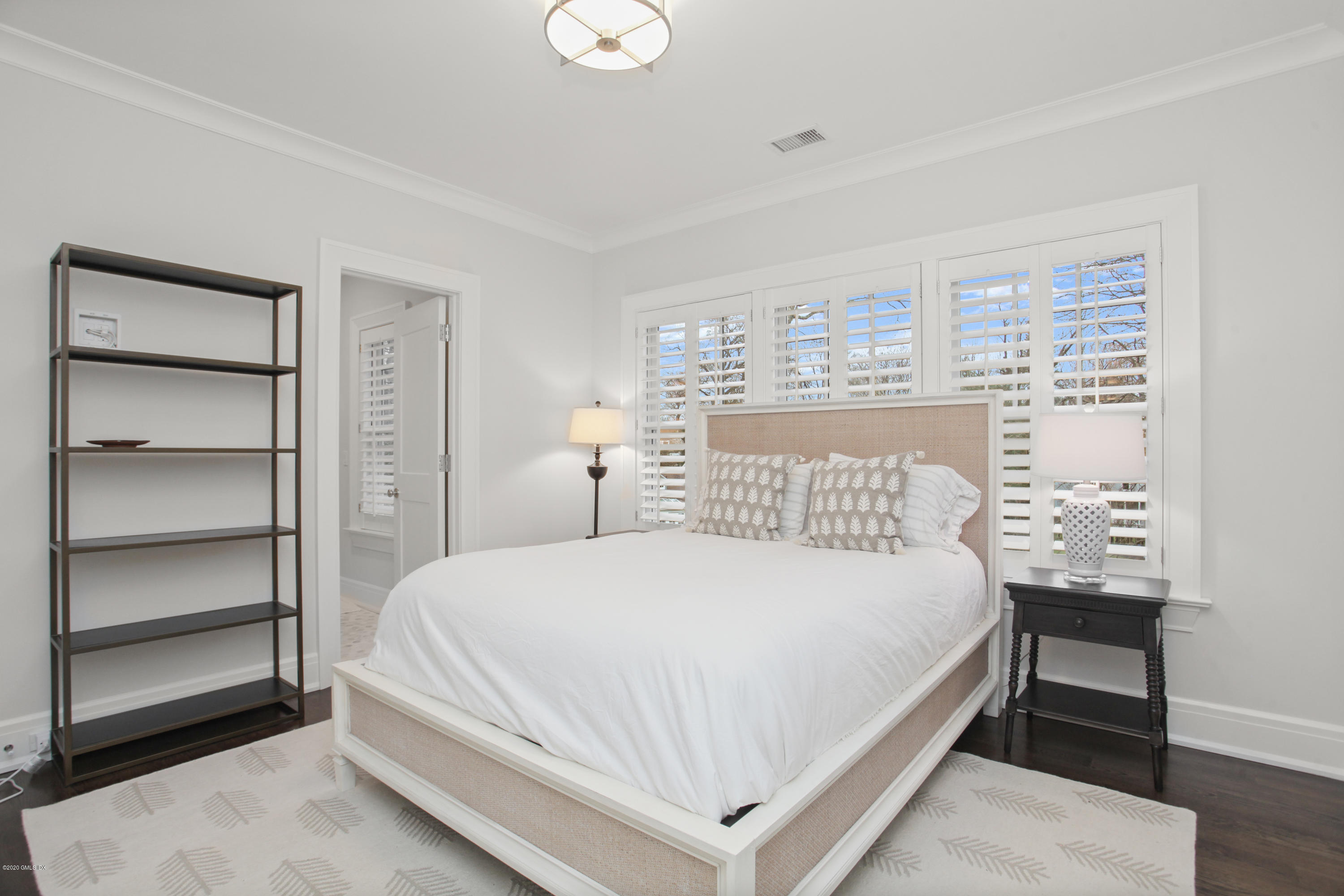 9 Shaw Place Riverside, CT 06878 - Photo 14 of 27 a bedroom with a bed and a night stand