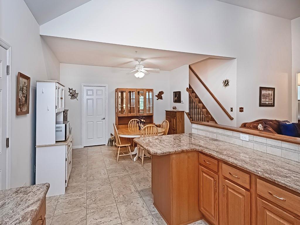 115 Shelton Place Drive Evans City, PA 16033 - Photo 13 of 24 a view of a kitchen with furniture and refrigerator