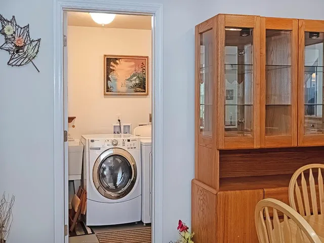 a view of a door and a sink