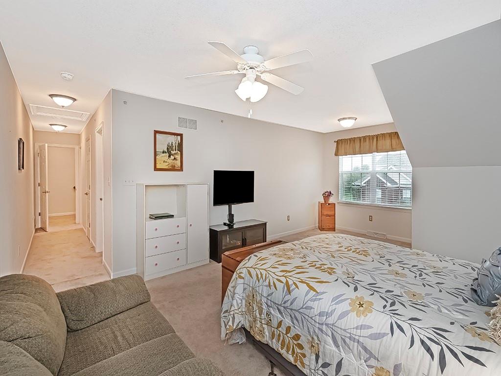 115 Shelton Place Drive Evans City, PA 16033 - Photo 20 of 24 a bedroom with a large bed and a window