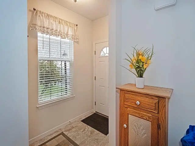 a view of entryway with wooden floor