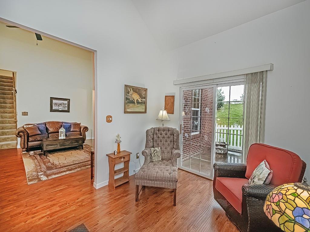 115 Shelton Place Drive Evans City, PA 16033 - Photo 7 of 24 a living room with furniture and a wooden floor