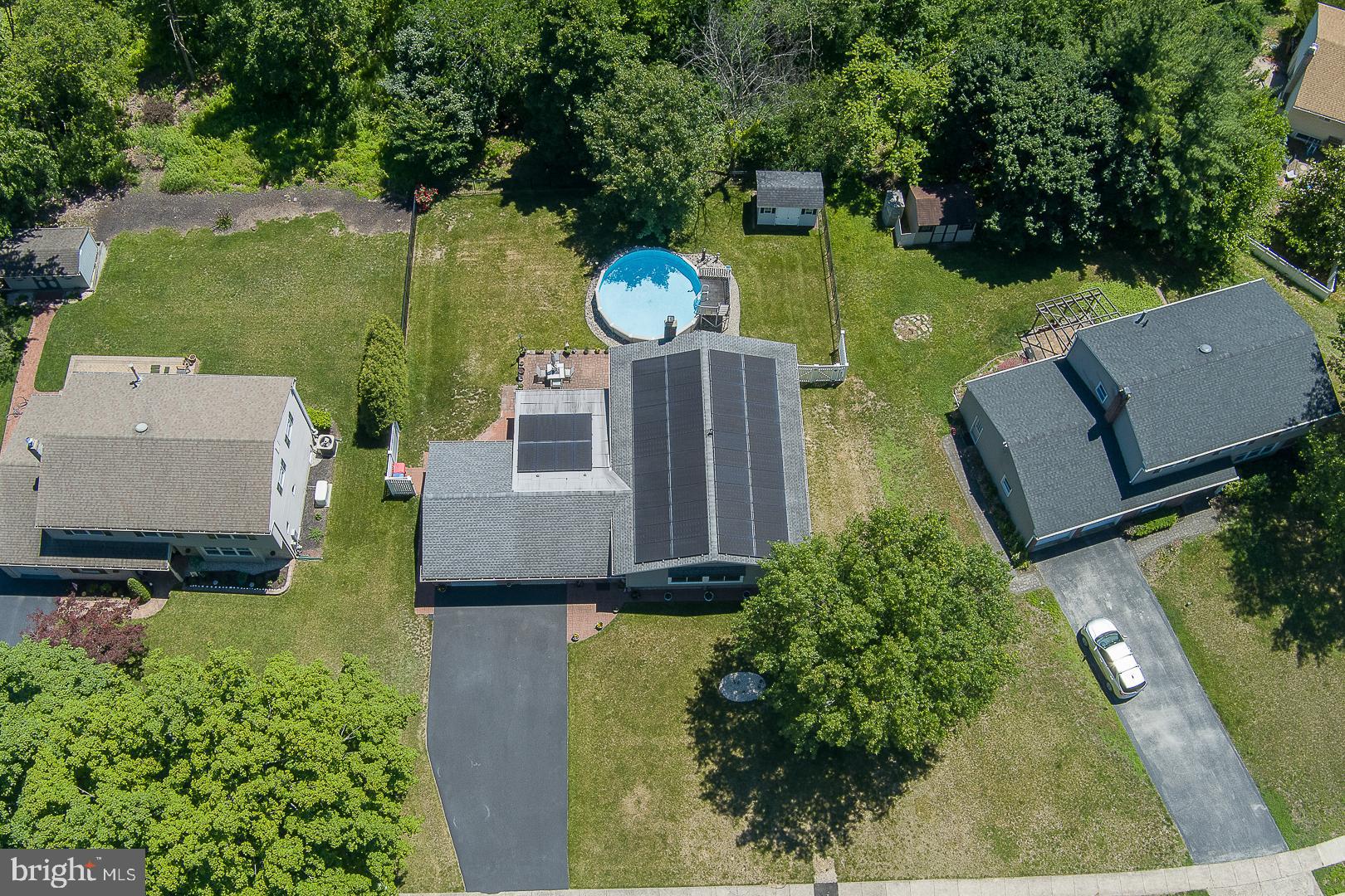 848 Mourning Dove Road Audubon, PA 19403 - Photo 75 of 86 an aerial view of a house with a garden and yard