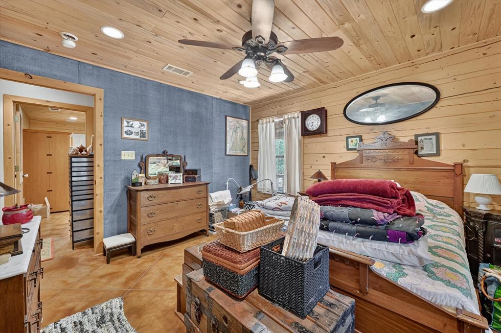 1623 3 Skillet Road Springtown, TX 76082 - Photo 27 of 40 Wood-paneled ceiling with recessed lighting and ceiling fan